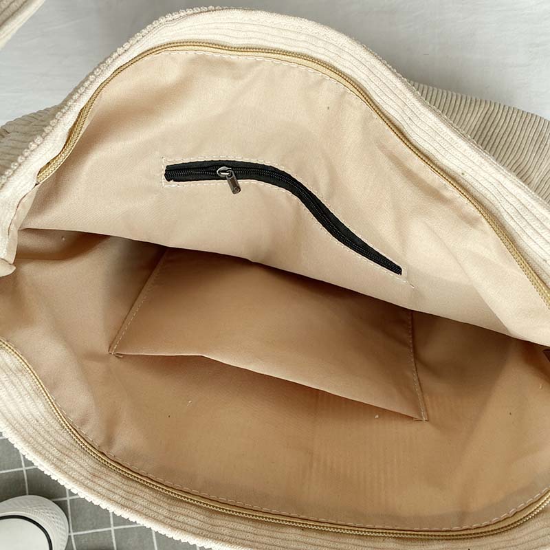 Trijntje — schoudertas met korte draagband