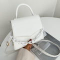 Reina — handtas met magneetsluiting